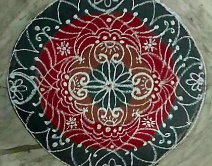 Freehand rangoli with recycled colours 